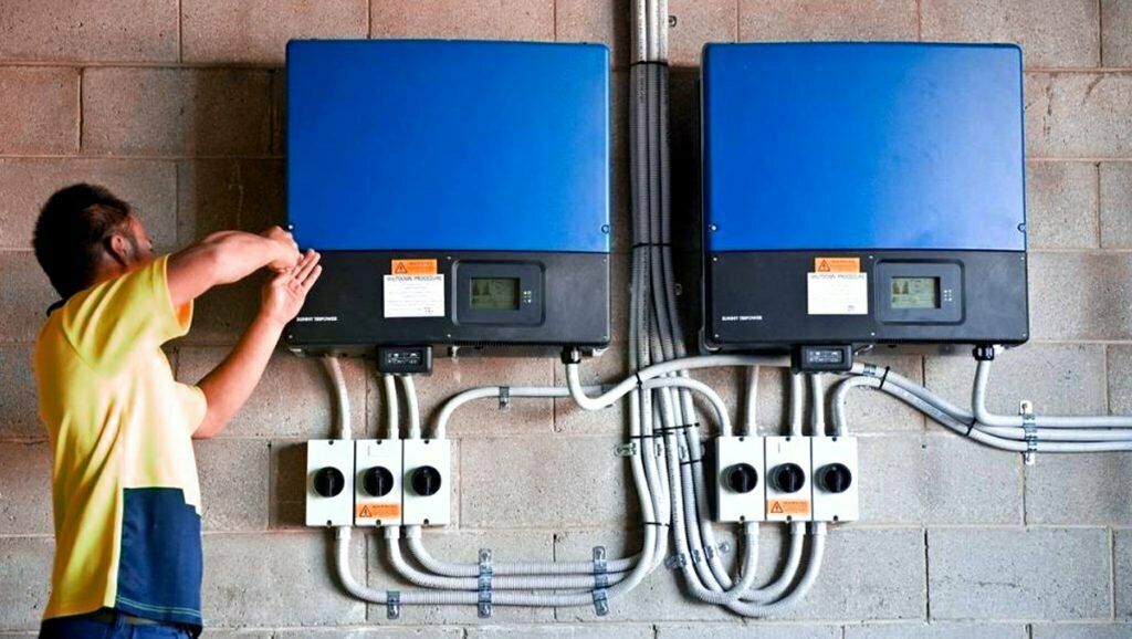 Employee-Repairing-Solar-Inverters